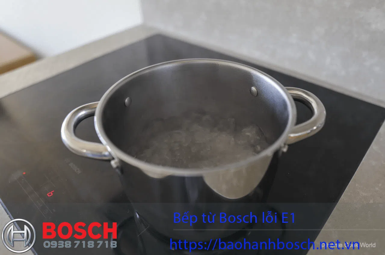 Nồi hơi Bosch lỗi E1 đang hoạt động trên bếp từ, cần kiểm tra và bảo hành chính hãng để đảm bảo an toàn và hiệu suất lâu dài.
